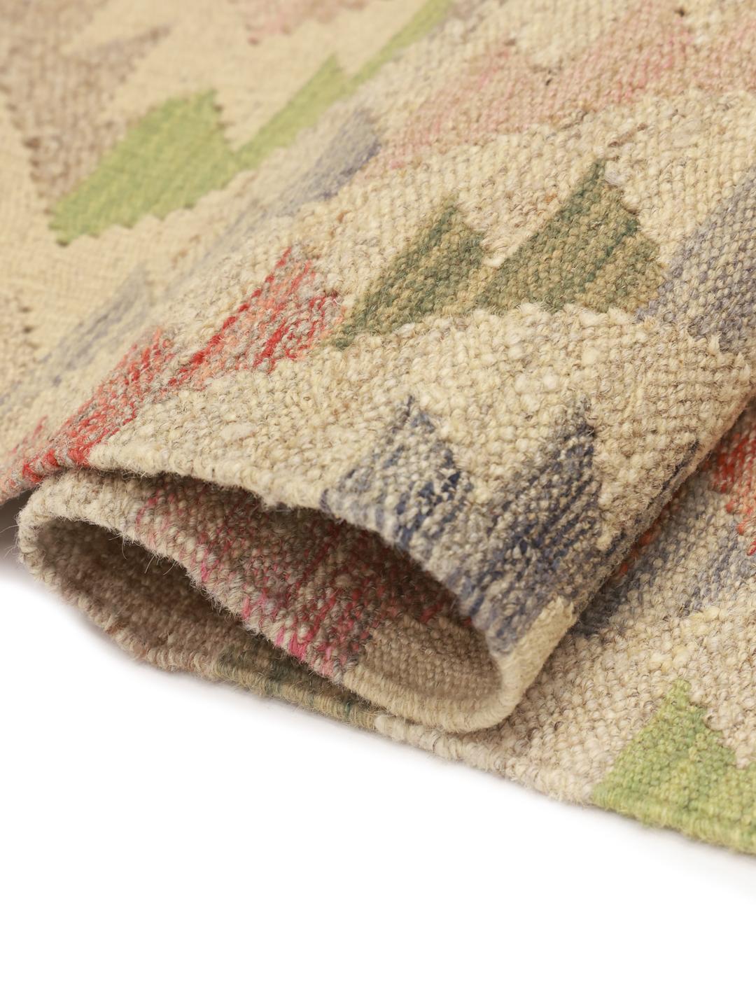 Hand-woven Afghan runner with a geometric diamond pattern in multicolour wool