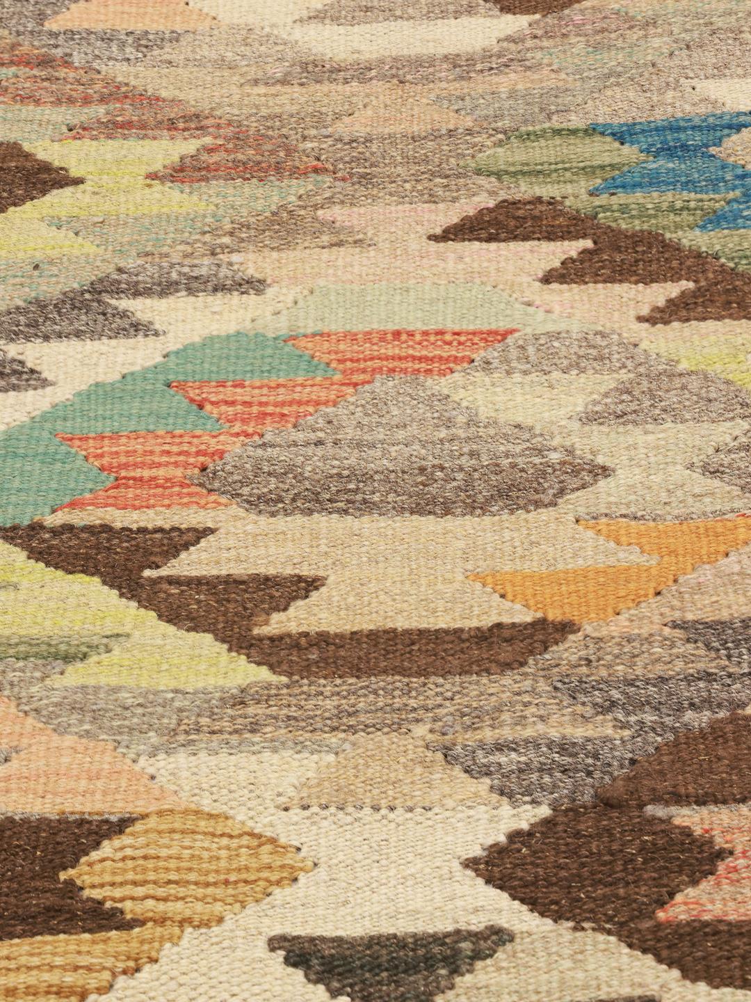 Handmade runner rug from Afghanistan in beige with geometric patterns