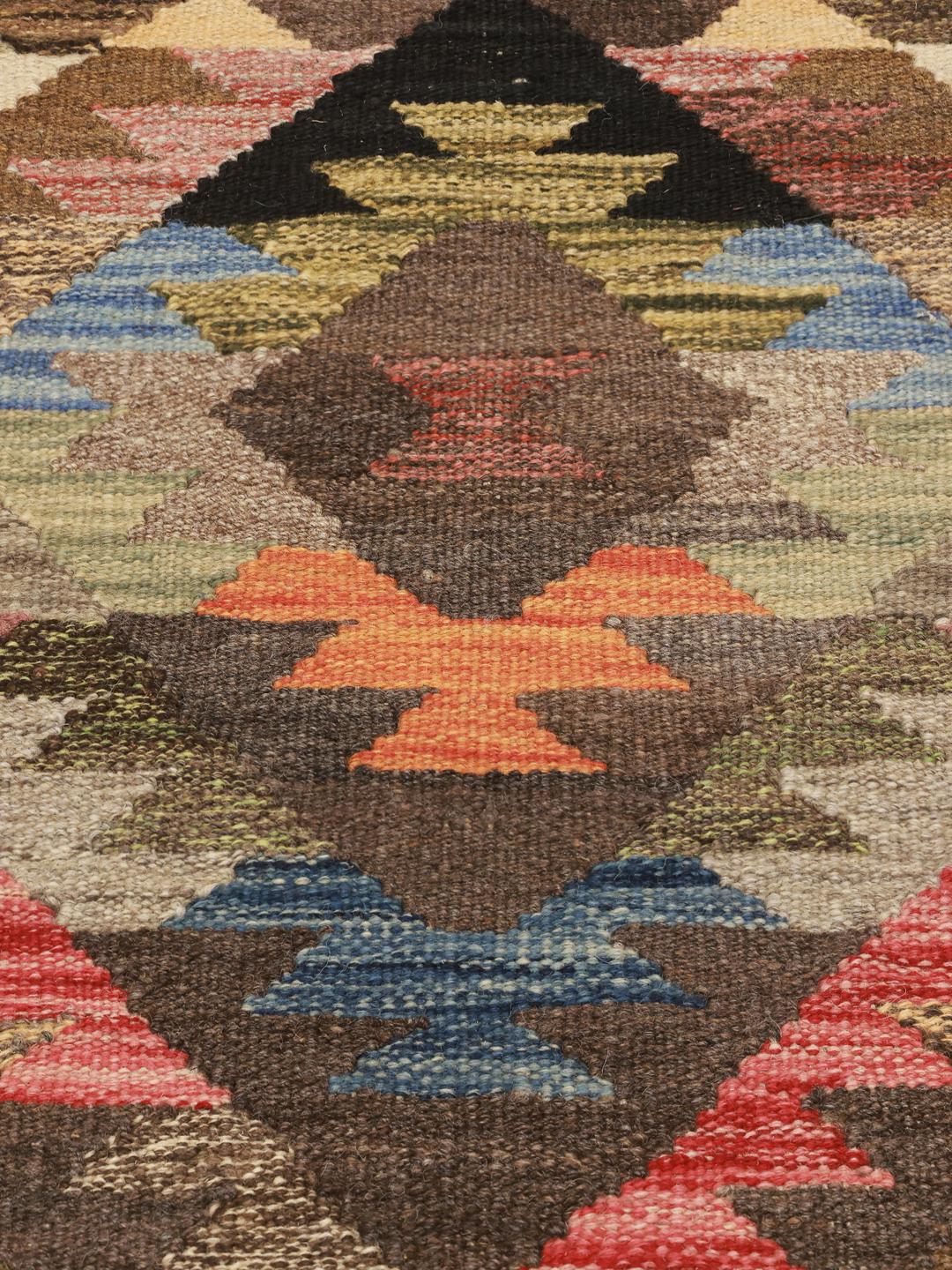 Hand-woven Middle Eastern runner with a vibrant multicolor geometric pattern