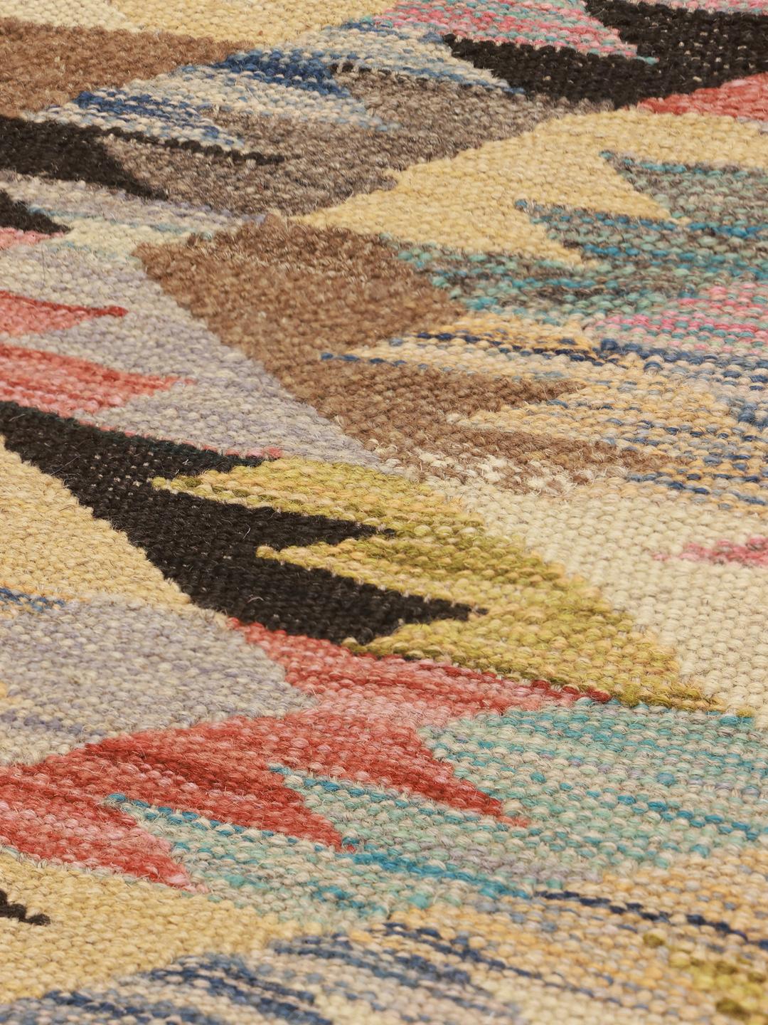 Hand-woven Afghan runner rug with a multicolor geometric pattern