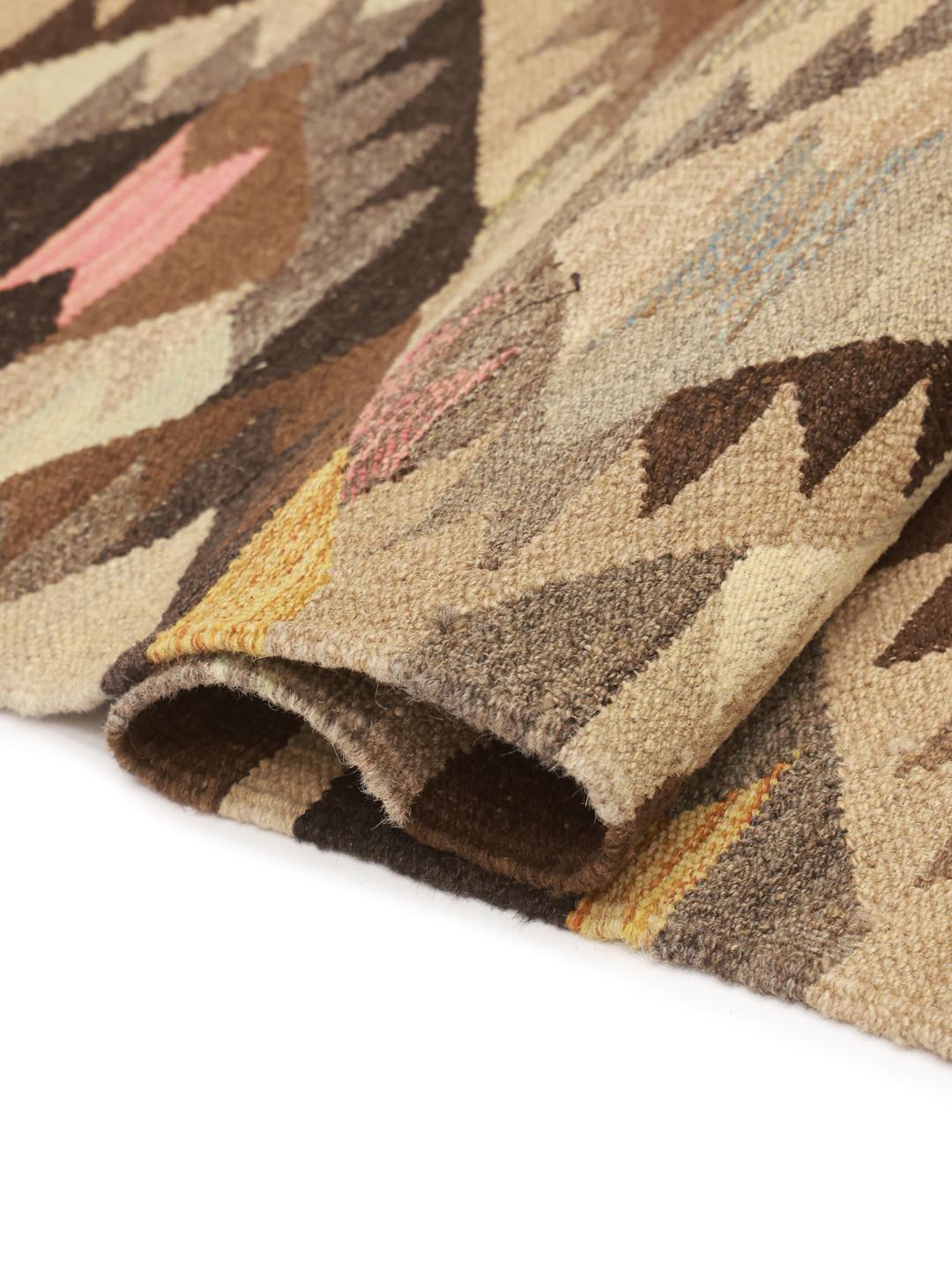 Hand-woven Afghan Wool runner with geometric diamond patterns in brown and earth tones