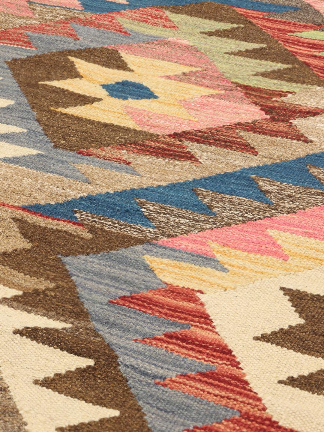 Handmade Afghan rug runner with multicoloured geometric pattern