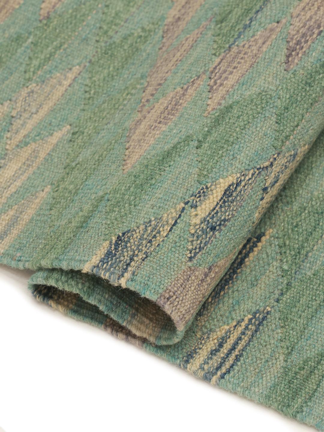 Handmade runner rug from Afghanistan in green