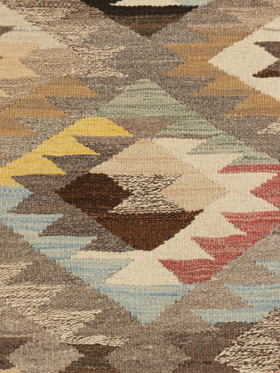 Hand-woven Afghan Kilim runner featuring a vibrant geometric pattern in multicolor Wool