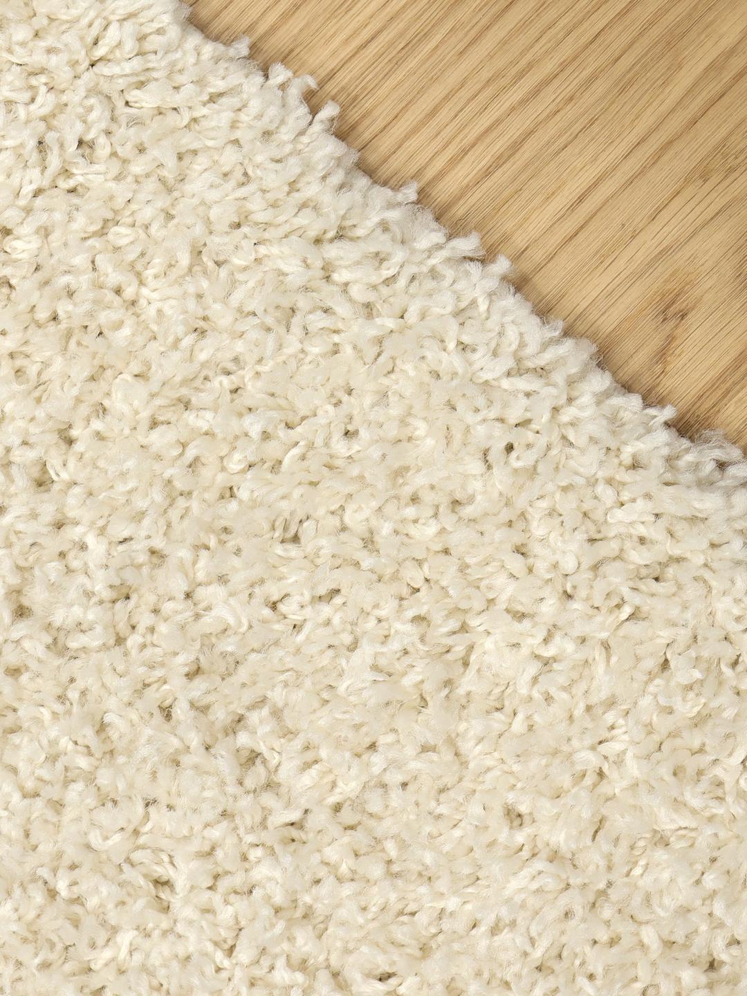 Tapis rond blanc à la texture douce