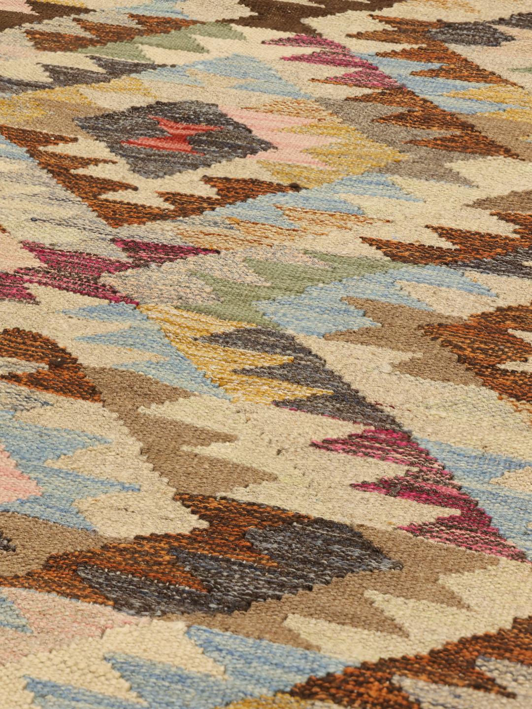 Handmade Middle Eastern runner with multicolor geometric patterns