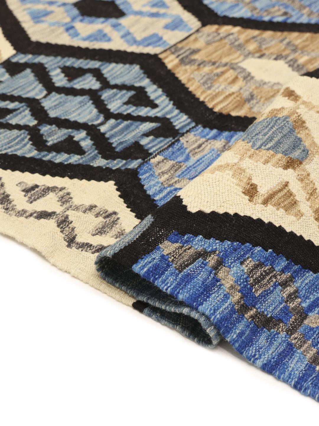 Handmade Afghan Kelim rug with blue and beige geometric patterns