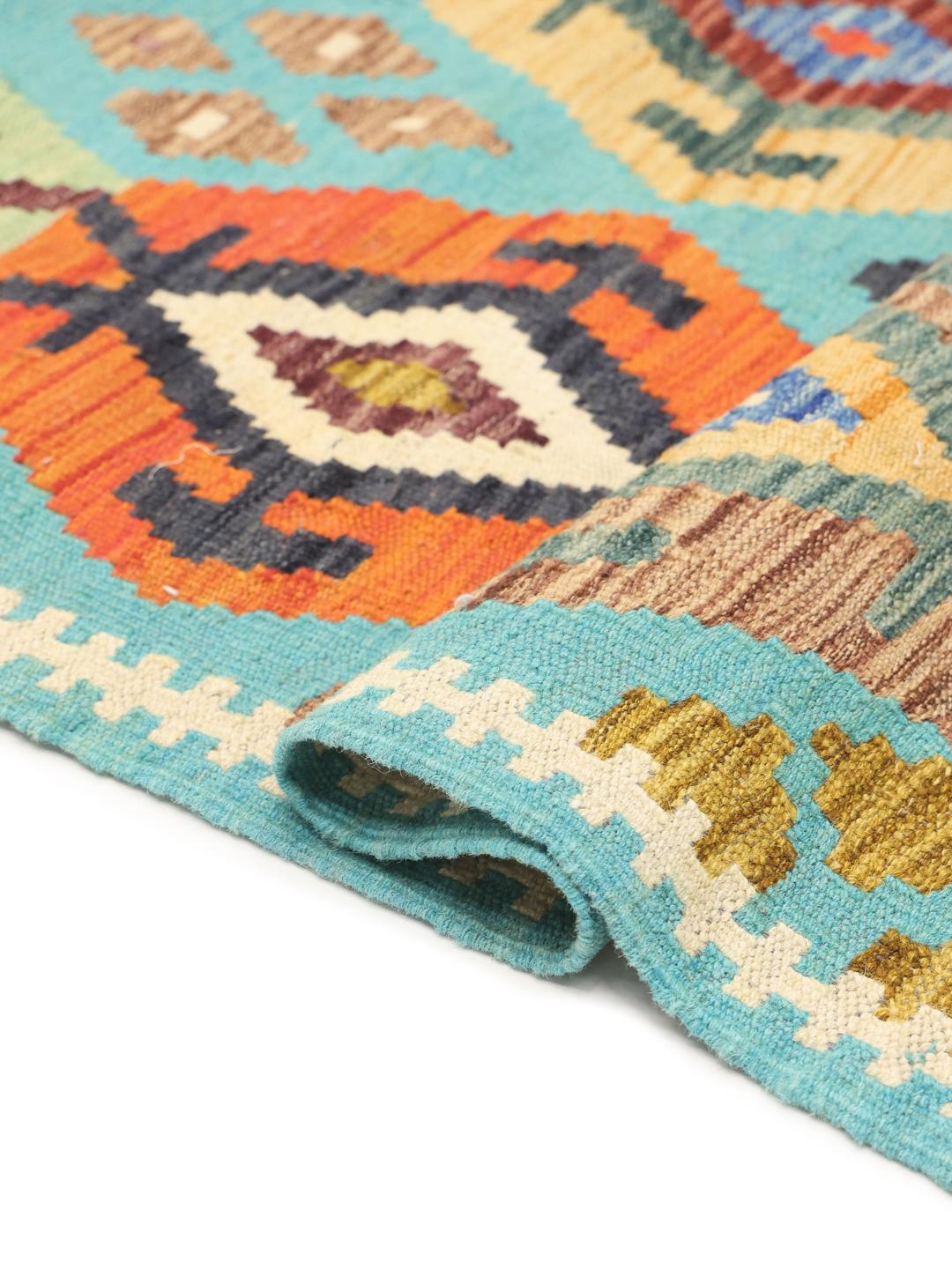 Hand-woven Afghan runner rug with geometric diamond motifs in multicolor and light-blue
