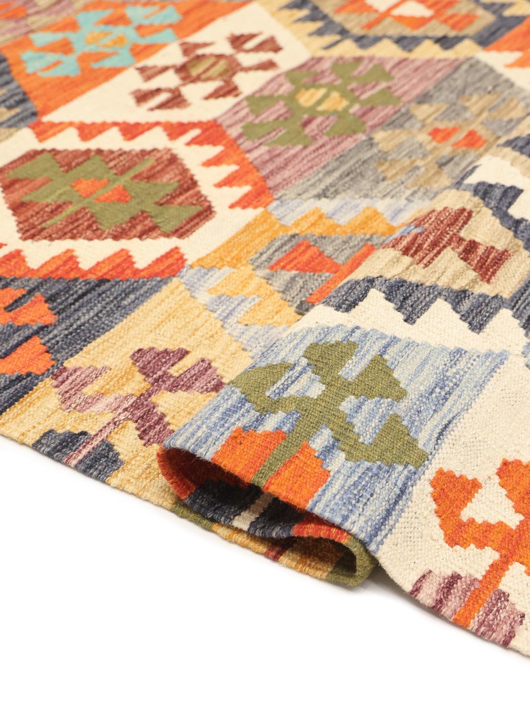 Handmade Afghan Kelim rug with vibrant multicolour geometric patterns