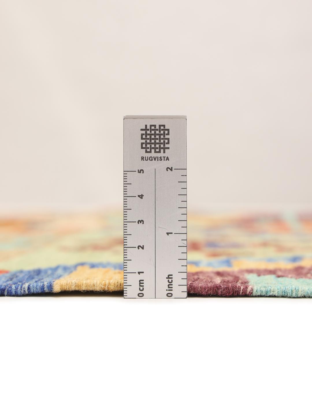 Handmade Afghan Kelim rug with multicolored geometric patterns