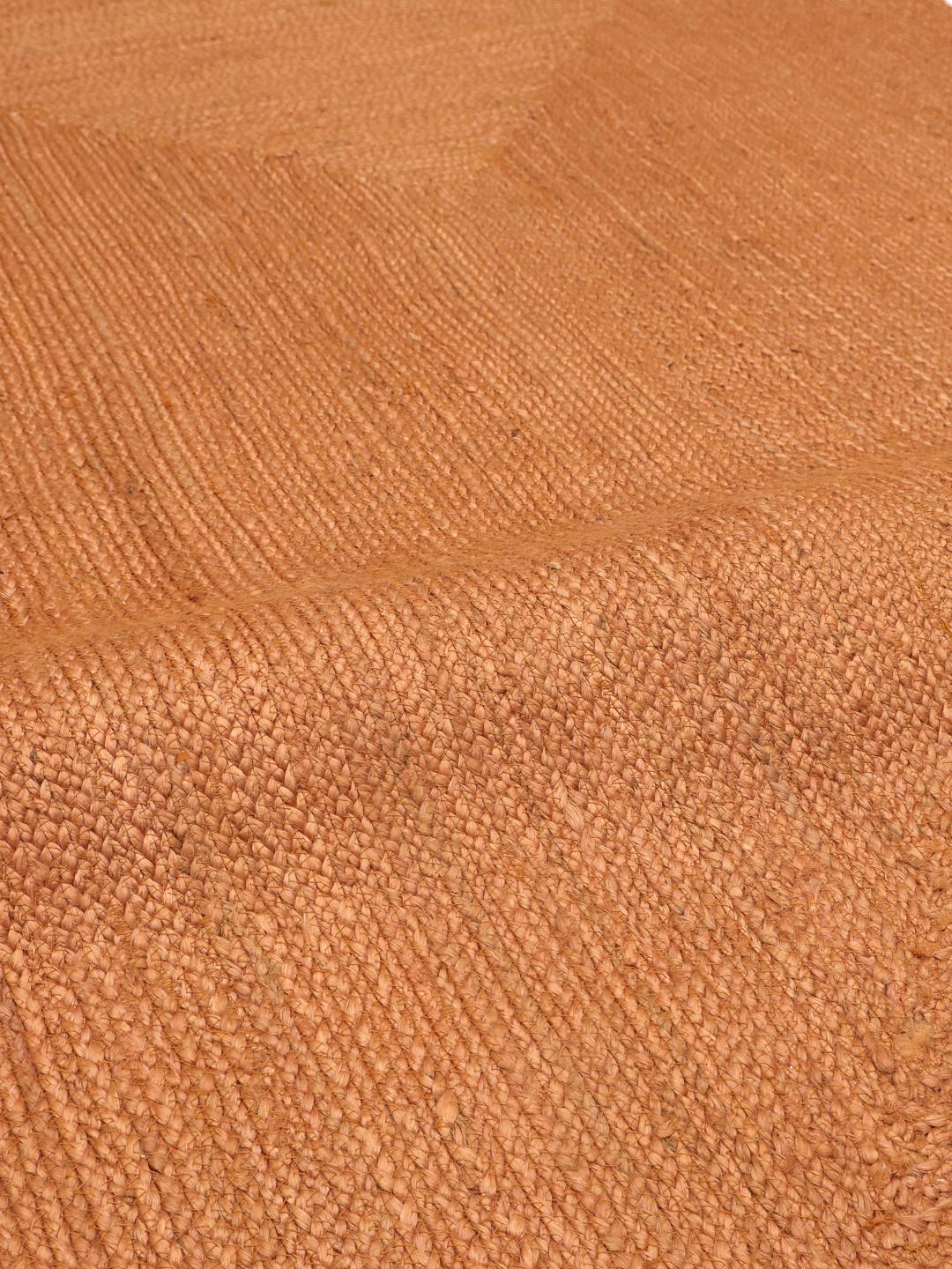 Tapis en jute orange tissé à la main