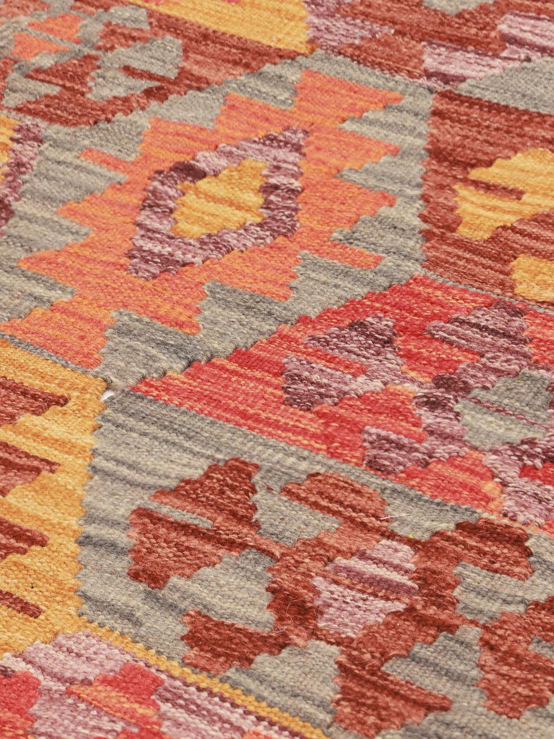 Handmade Afghan runner rug with geometric patterns in multicolor