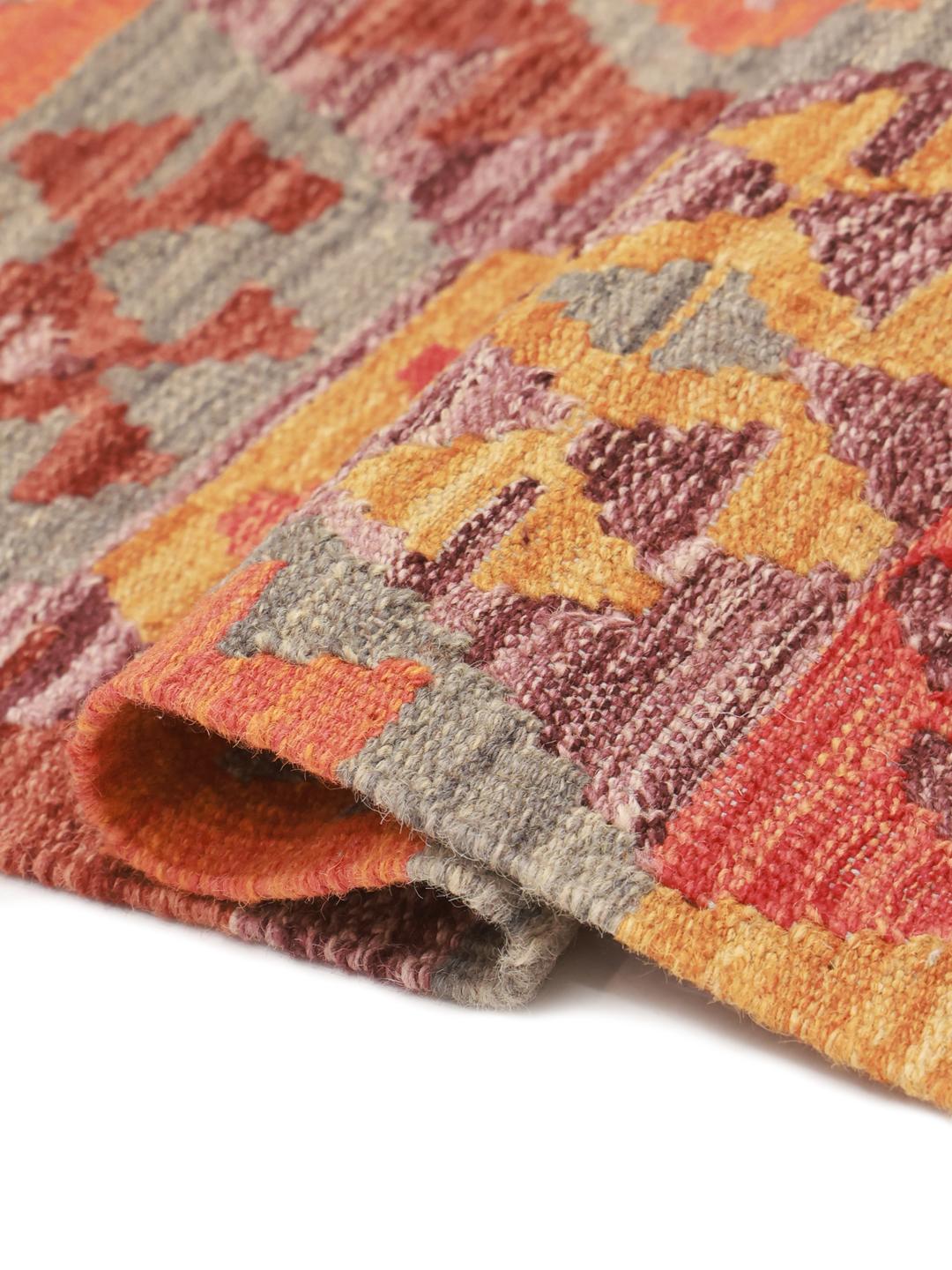 Handmade Afghan runner rug with geometric patterns in multicolor