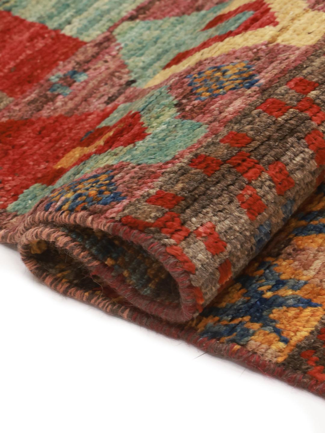 Handmade Afghan rug in multicolour