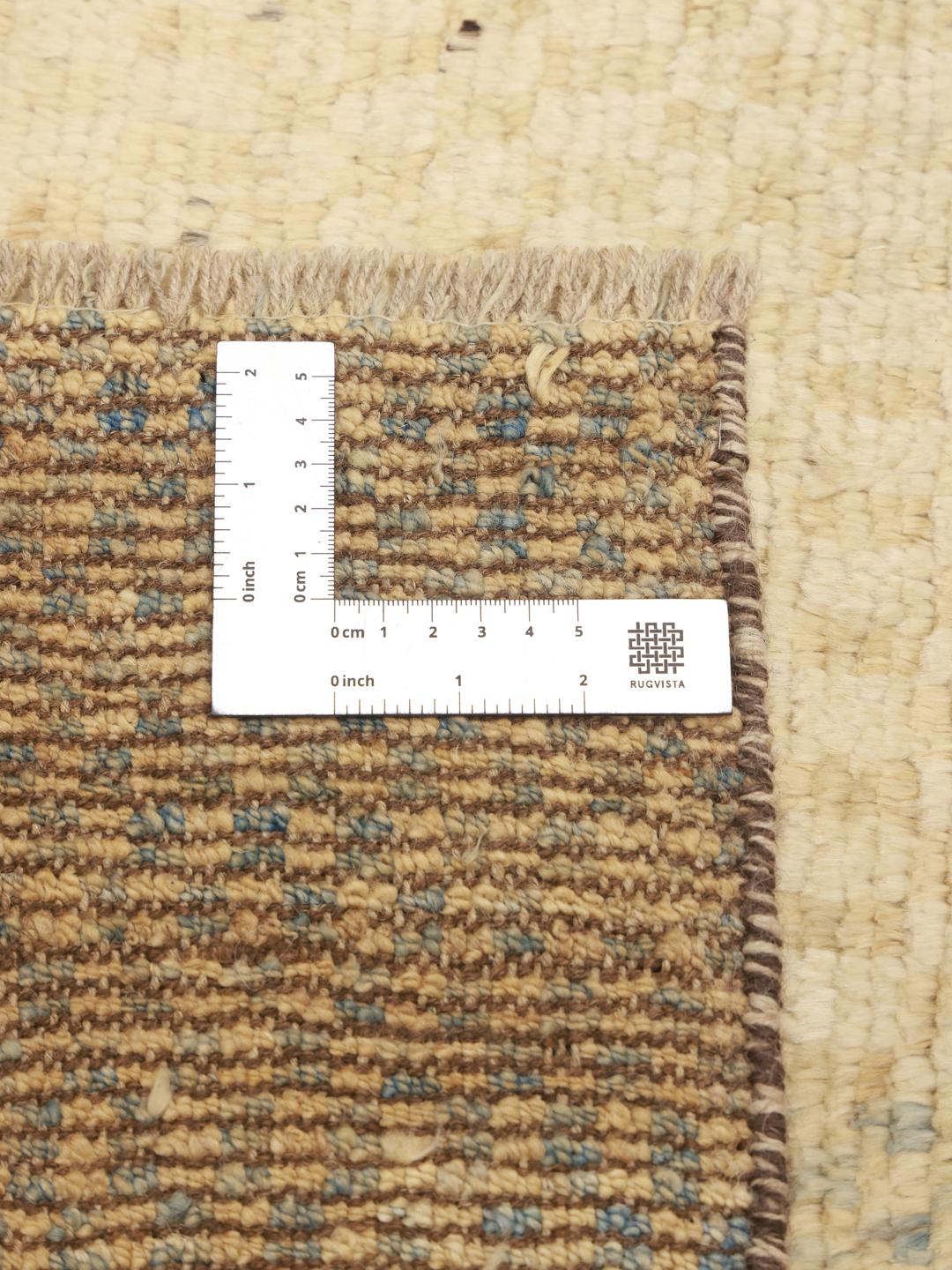 Hand-knotted Afghan rug with vibrant geometric patterns in a multicolor palette