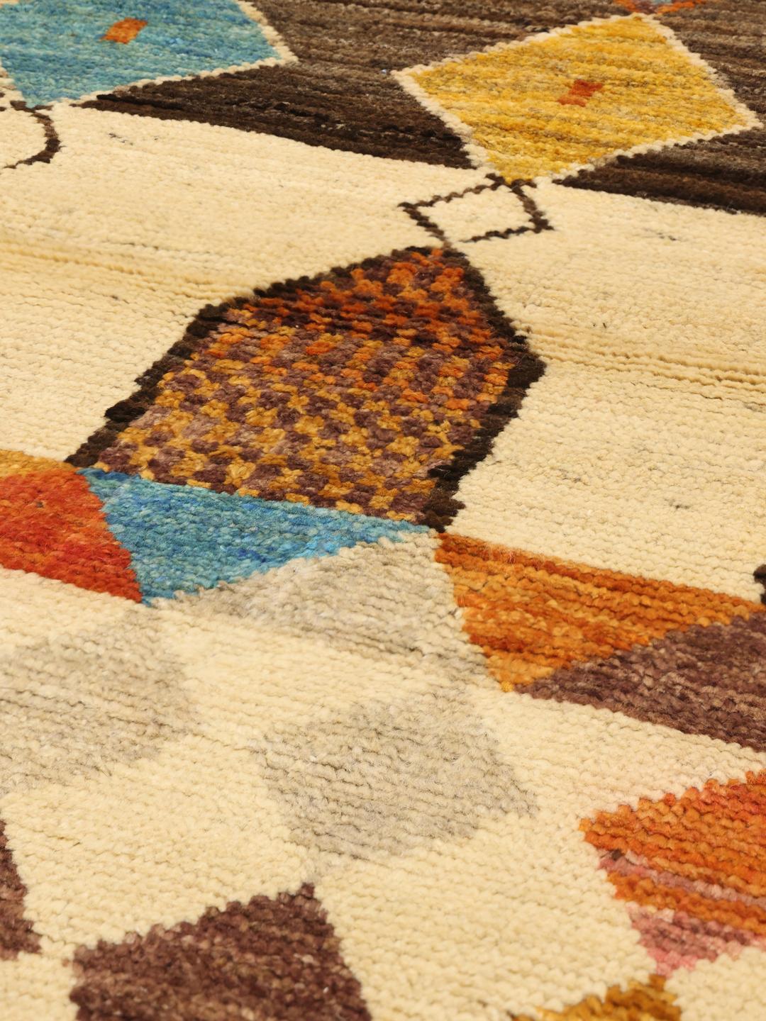 Handmade wool rug from Afghanistan in multicolour