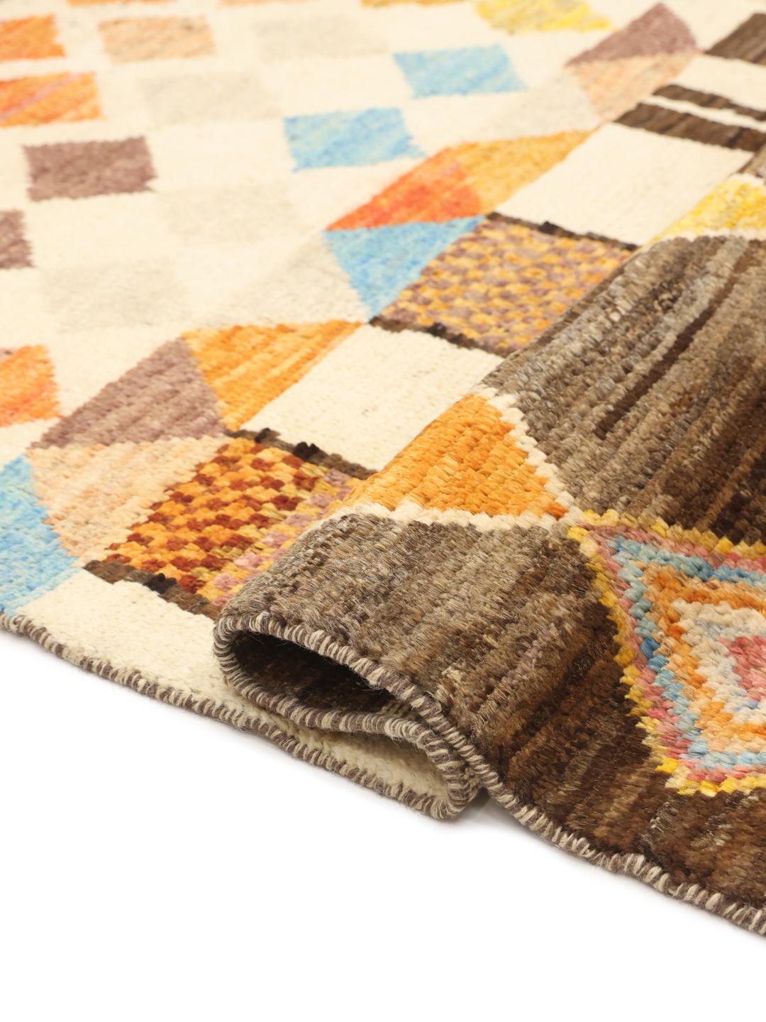 Handmade wool rug from Afghanistan in multicolour