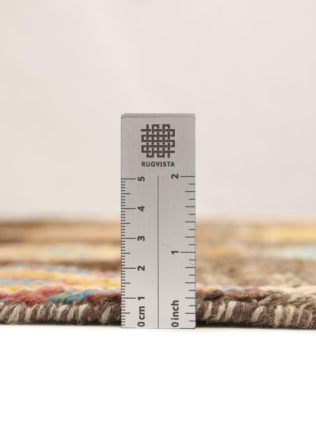 Handmade wool rug from Afghanistan in multicolour