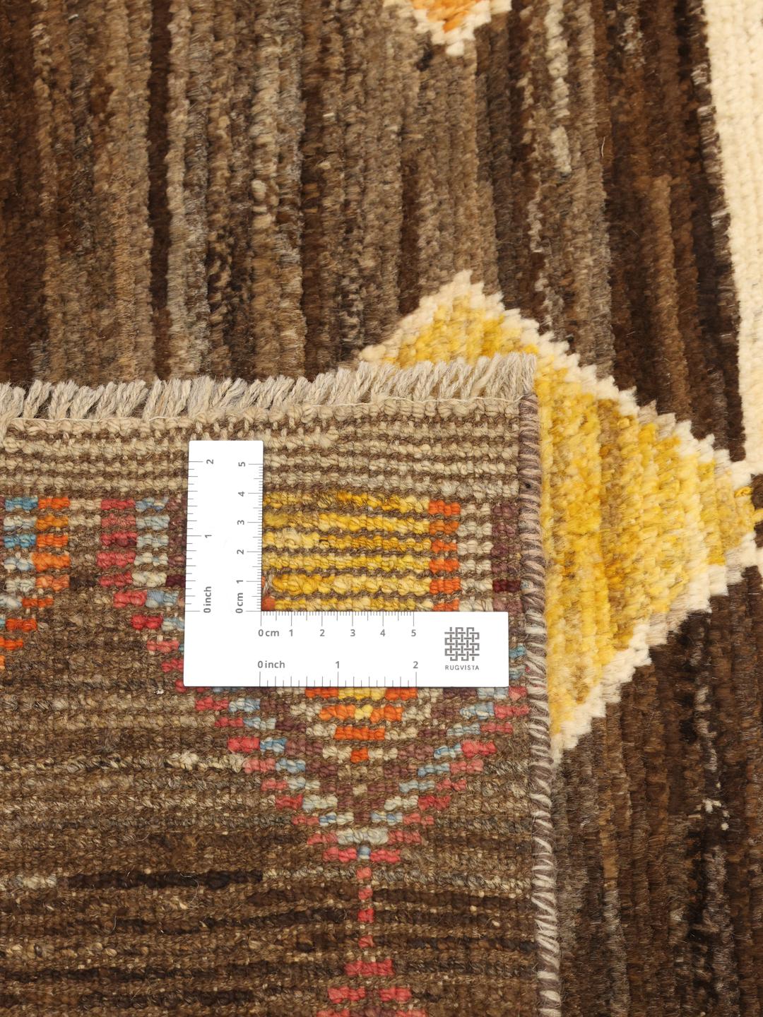 Handmade wool rug from Afghanistan in multicolour
