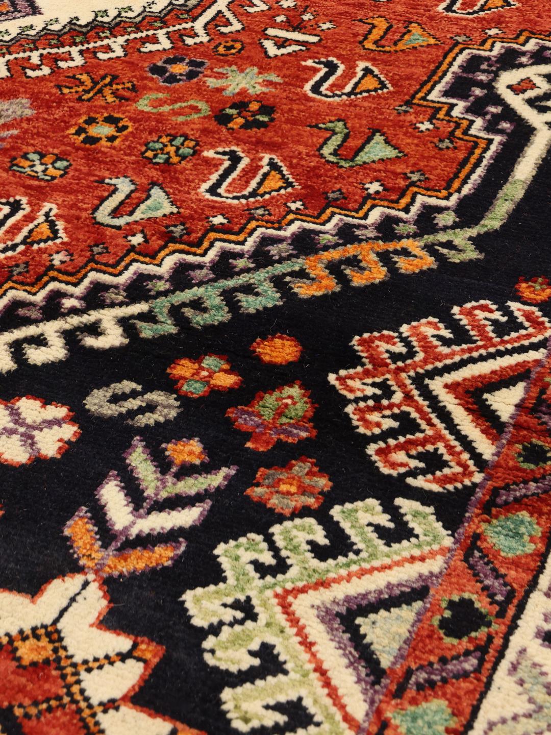 Handmade Afghan rug in multicolour