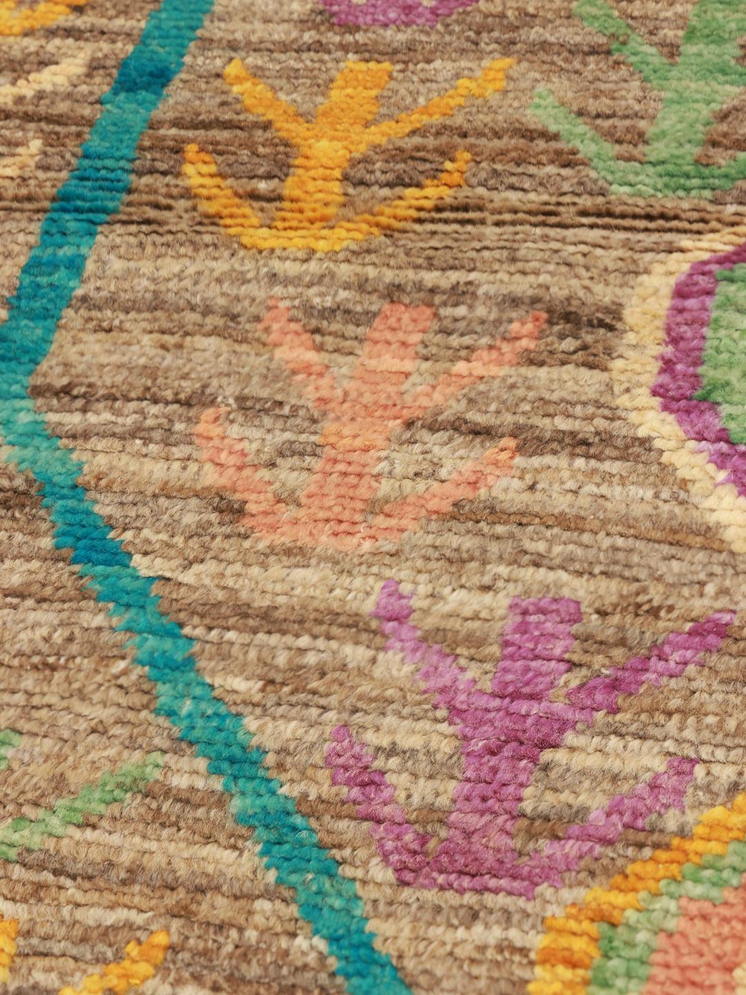 Hand-knotted Berber Colourful rug from Afghanistan in brown with vibrant motifs