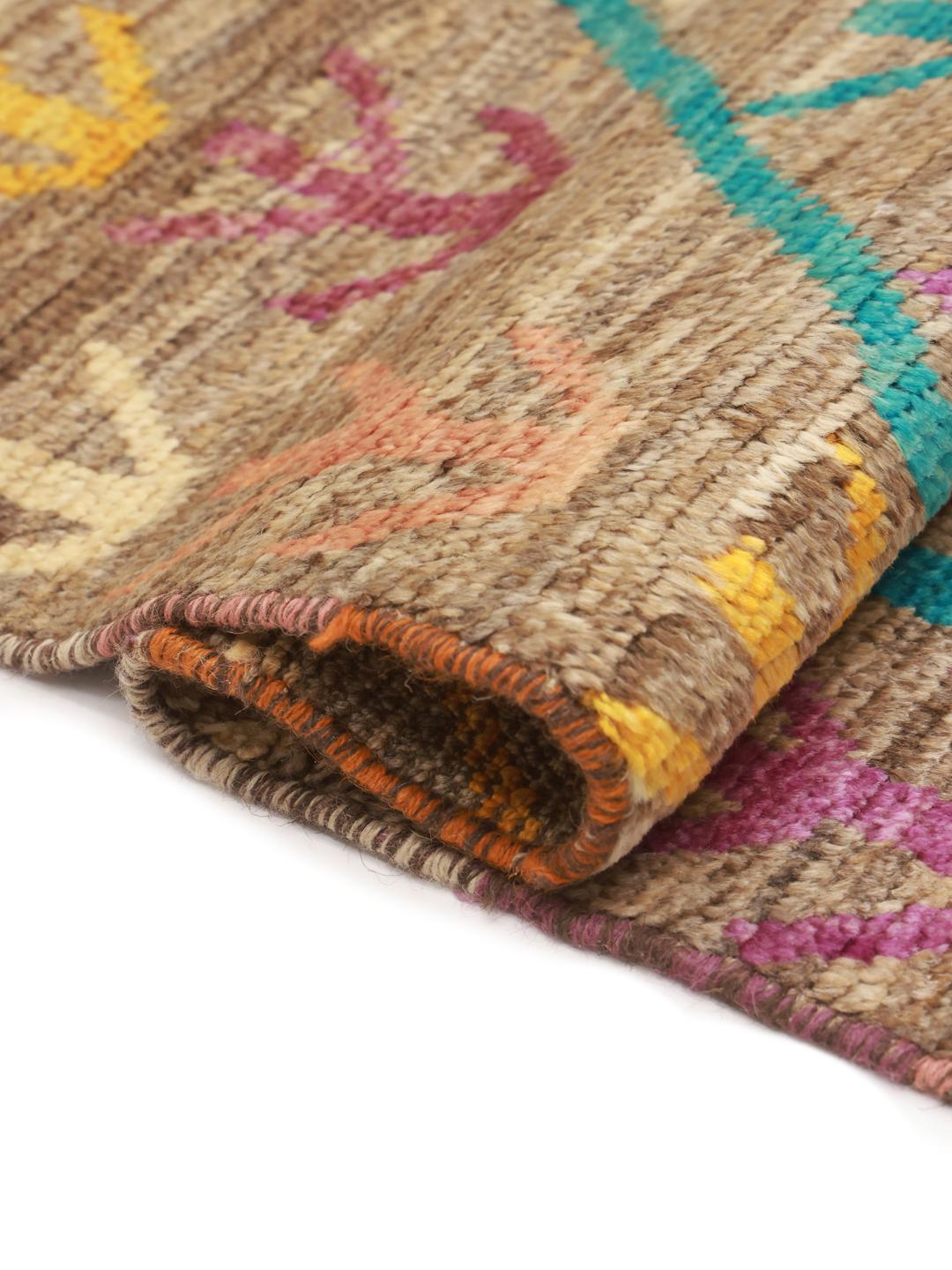 Hand-knotted Berber Colourful rug from Afghanistan in brown with vibrant motifs