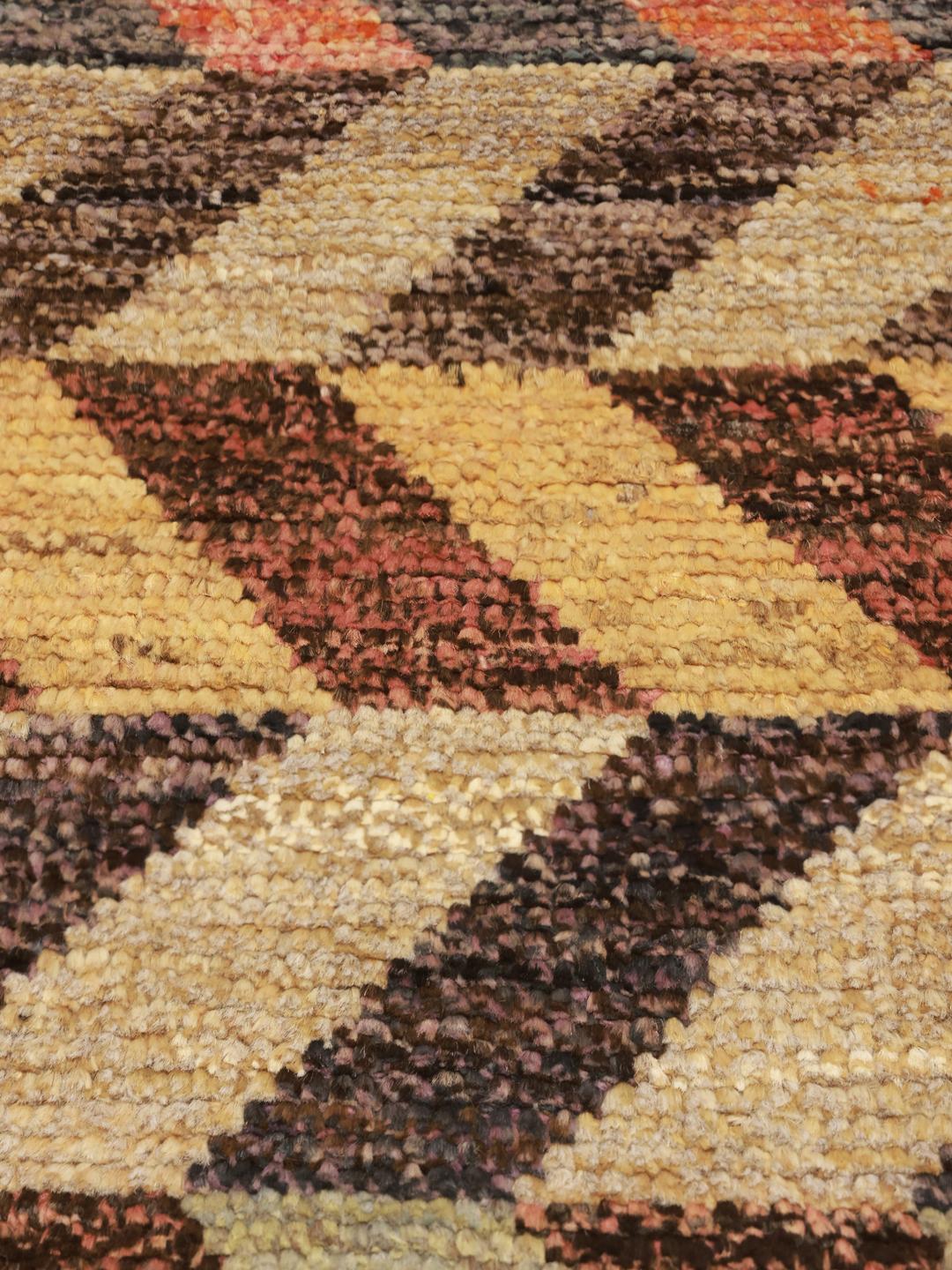 Hand-knotted Afghan rug with a multicolor chevron pattern