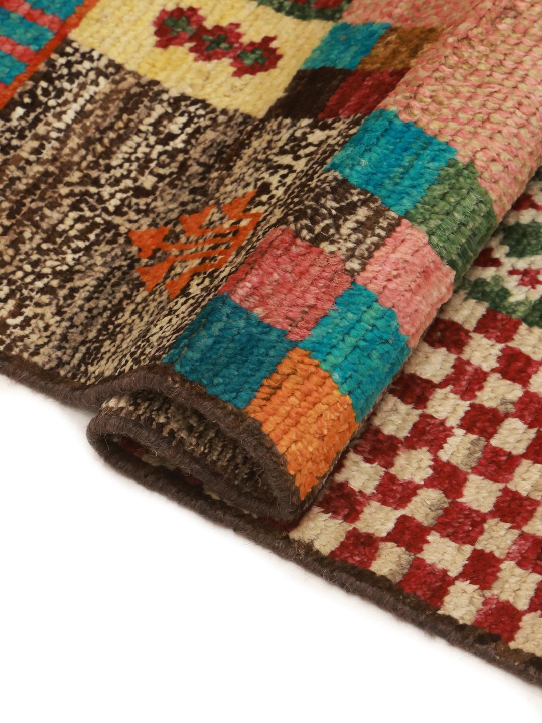 Handgeknoopte Afghaanse loper met een kleurrijk geometrisch patchworkontwerp