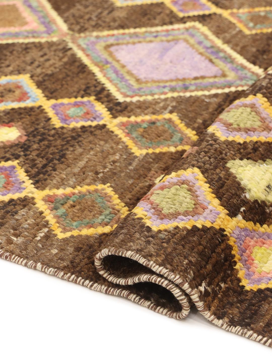 Handmade Afghan rug with colourful diamond motifs and brown background