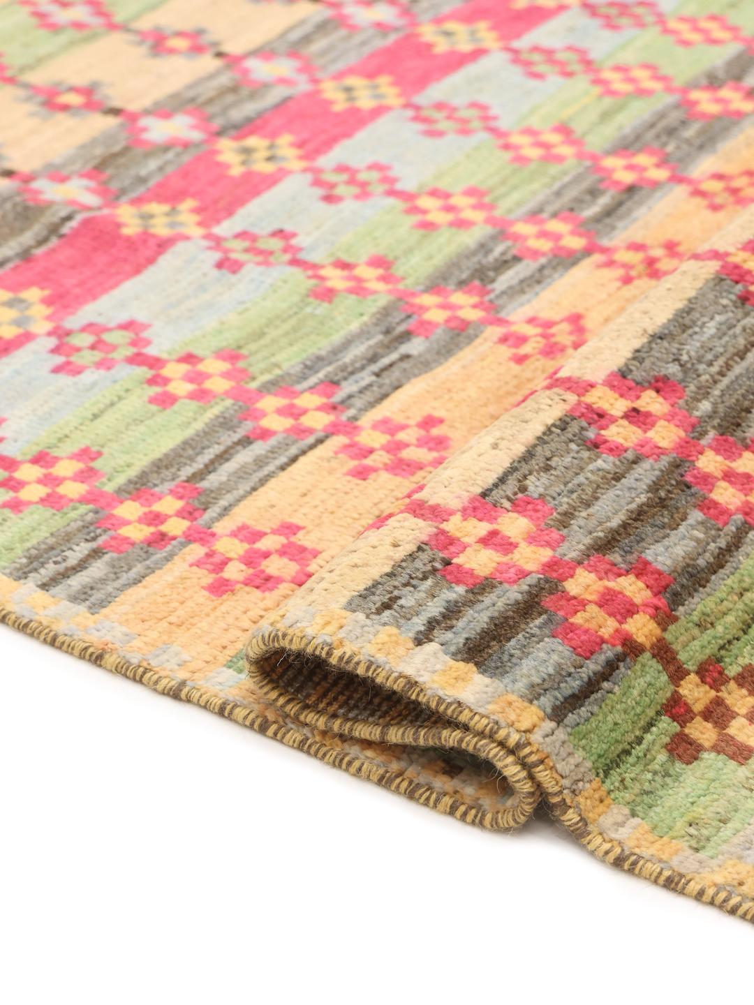 Handmade Afghan rug with multicolored stripes and geometric motifs