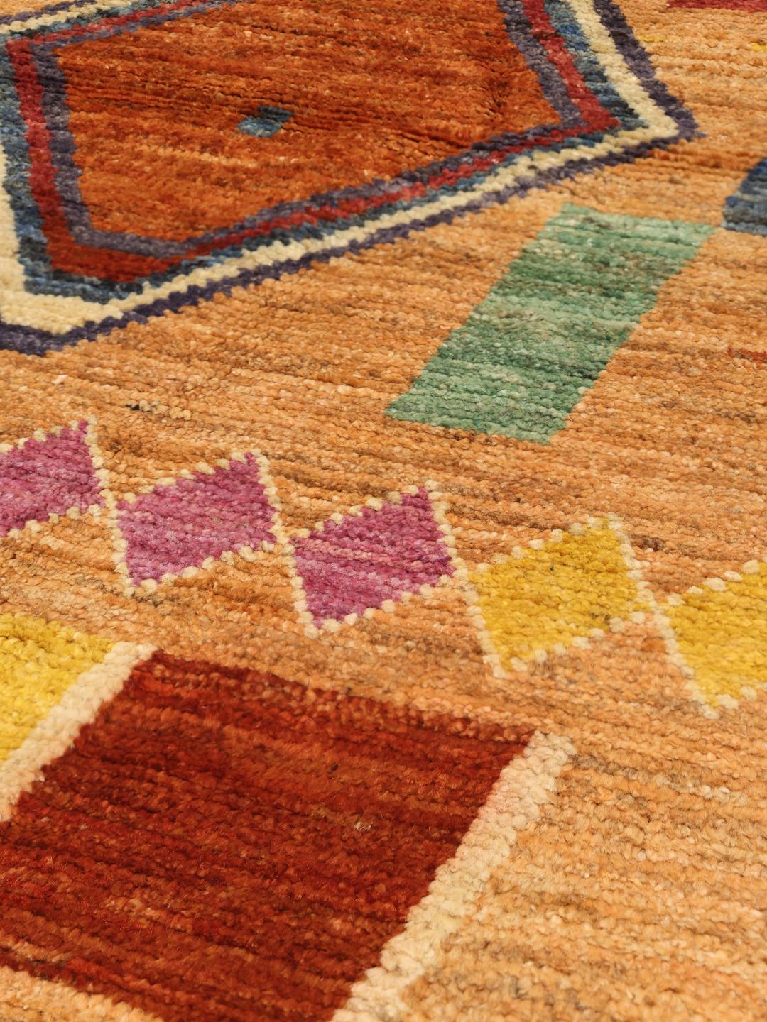 Hand-knotted rug from Afghanistan in beige with colourful geometric motifs