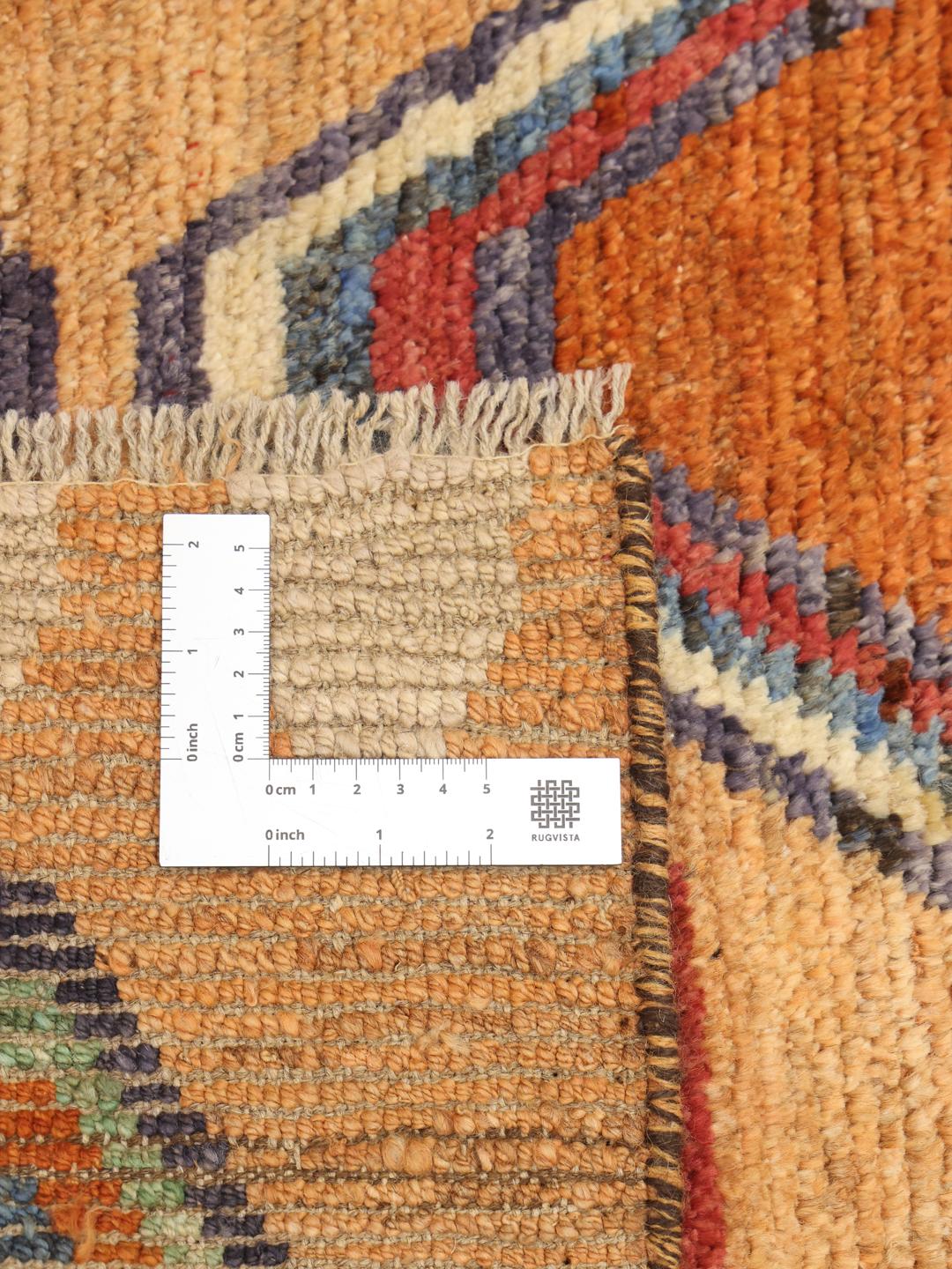Hand-knotted rug from Afghanistan in beige with colourful geometric motifs