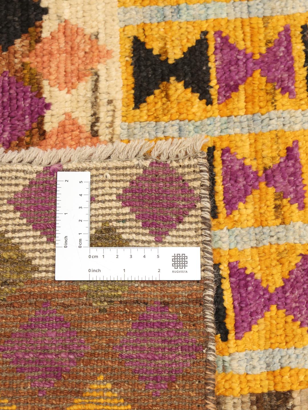 Handmade Afghan rug in multicolour