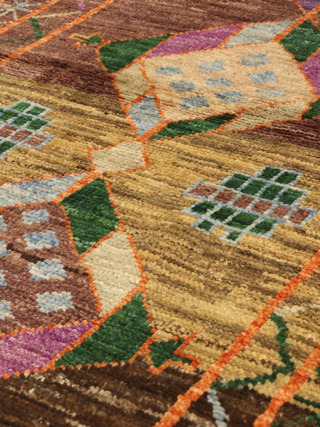 Handmade wool rug from Afghanistan in multicolour