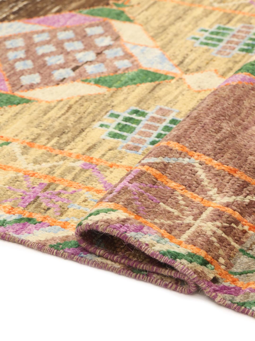 Handmade wool rug from Afghanistan in multicolour