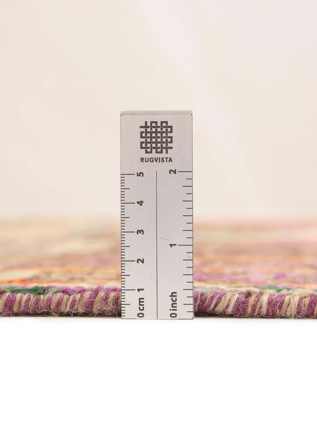 Handmade wool rug from Afghanistan in multicolour
