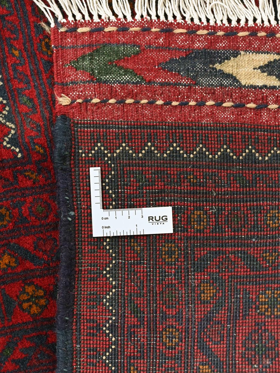 Wiązany ręcznie wełniany dywan Kunduz z Afganistanu w kolorze ciemnoczerwonym