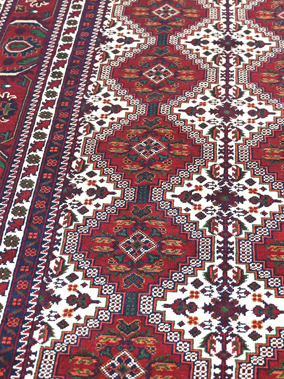 Kunduz rug from Afghanistan in red