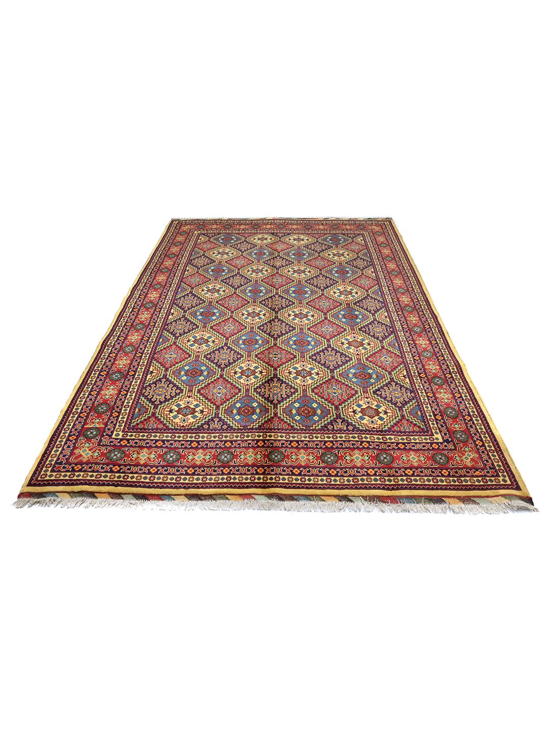 Hand-knotted Afghan Kunduz rug with red and blue geometric patterns