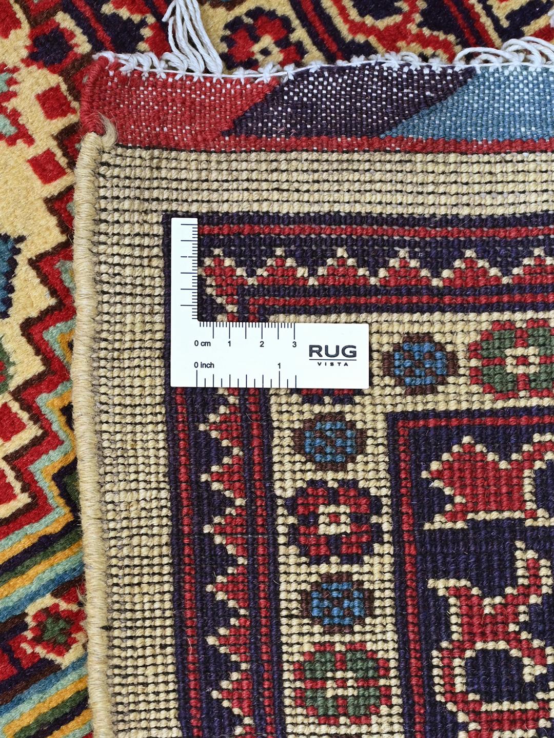 Hand-knotted Afghan Kunduz rug with red and blue geometric patterns