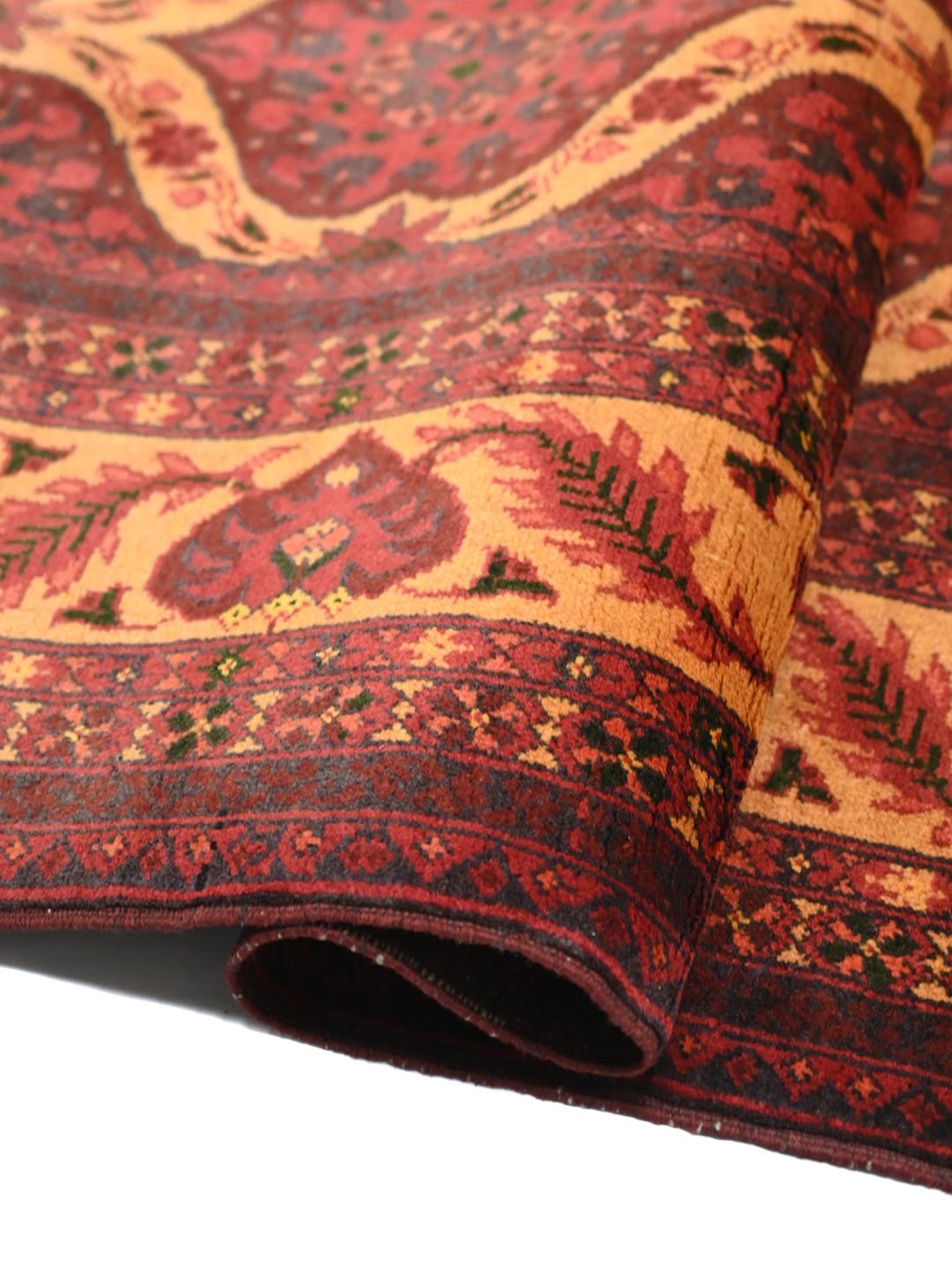 Kunduz rug from Afghanistan in dark-red and beige