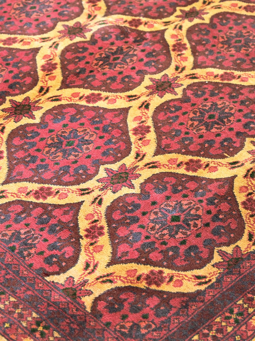 Kunduz rug from Afghanistan in dark-red and beige
