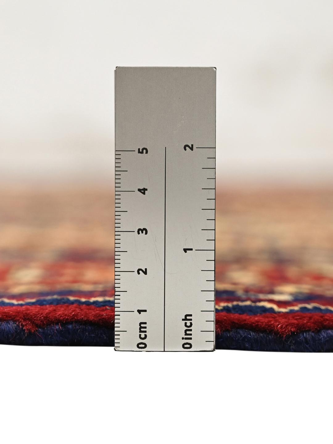 Hand-knotted Afghan Kunduz rug in deep red and blue tones