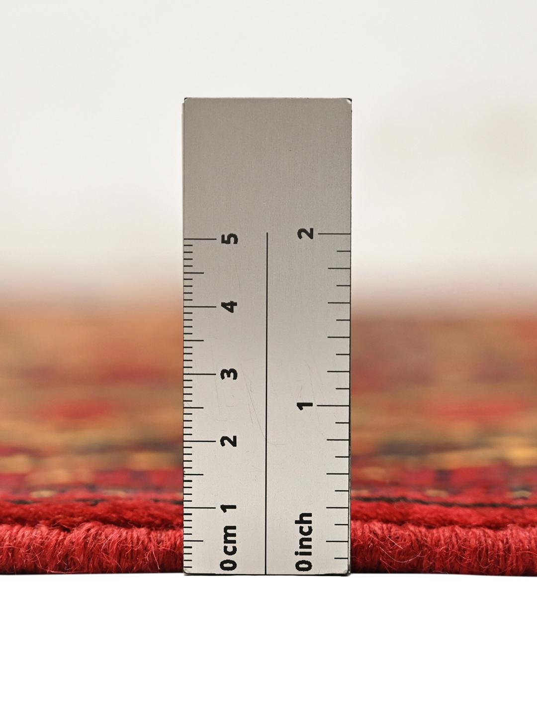 Handmade Afghan Kunduz rug in red