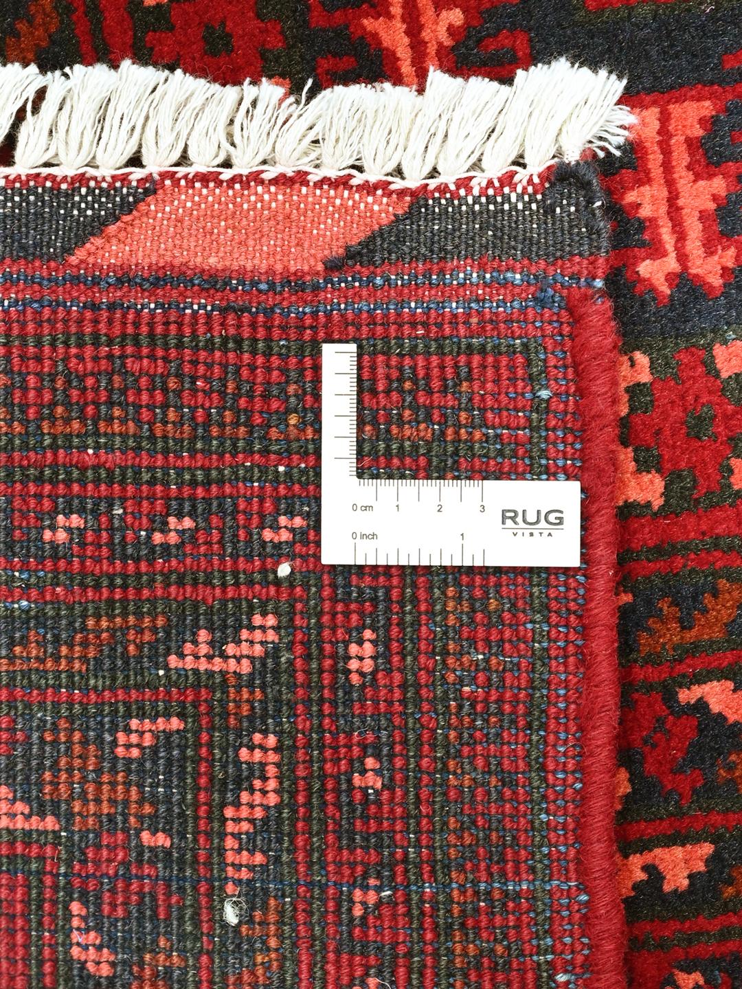 Håndknyttet afghansk Kunduz-tæppe i dyb rød med geometriske medaljonmønstre