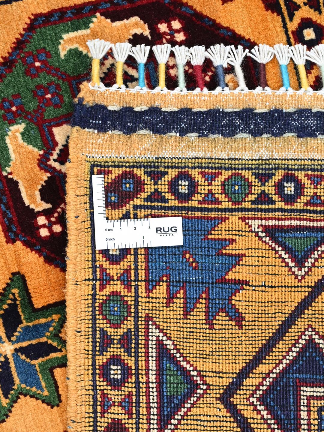 Håndknyttet Kunduz-tæppe fra Afghanistan i gul med traditionelle motiver