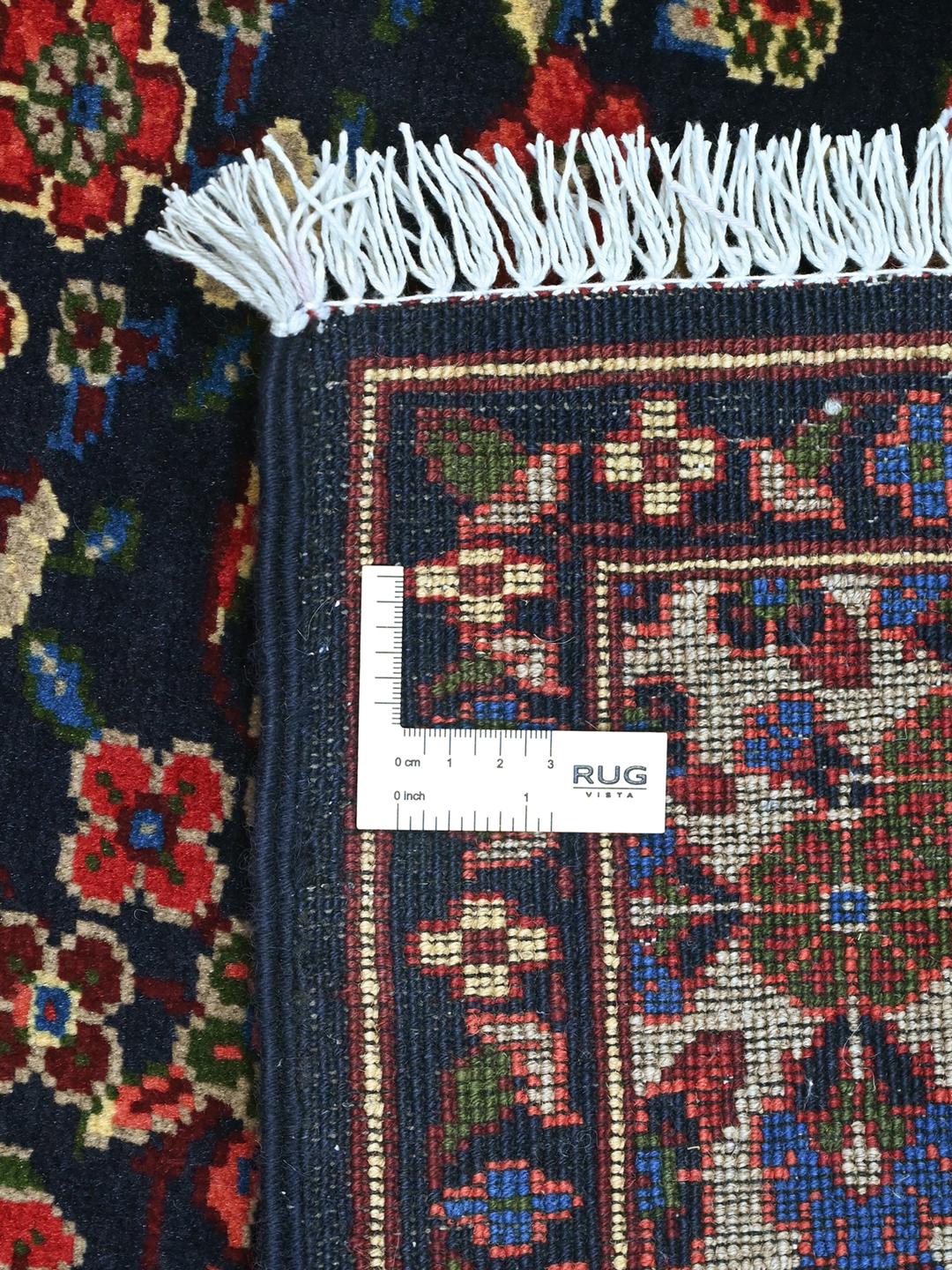 Håndknyttet afghansk Kunduz-tæppe med blomstermotiver på en mørkeblå bund
