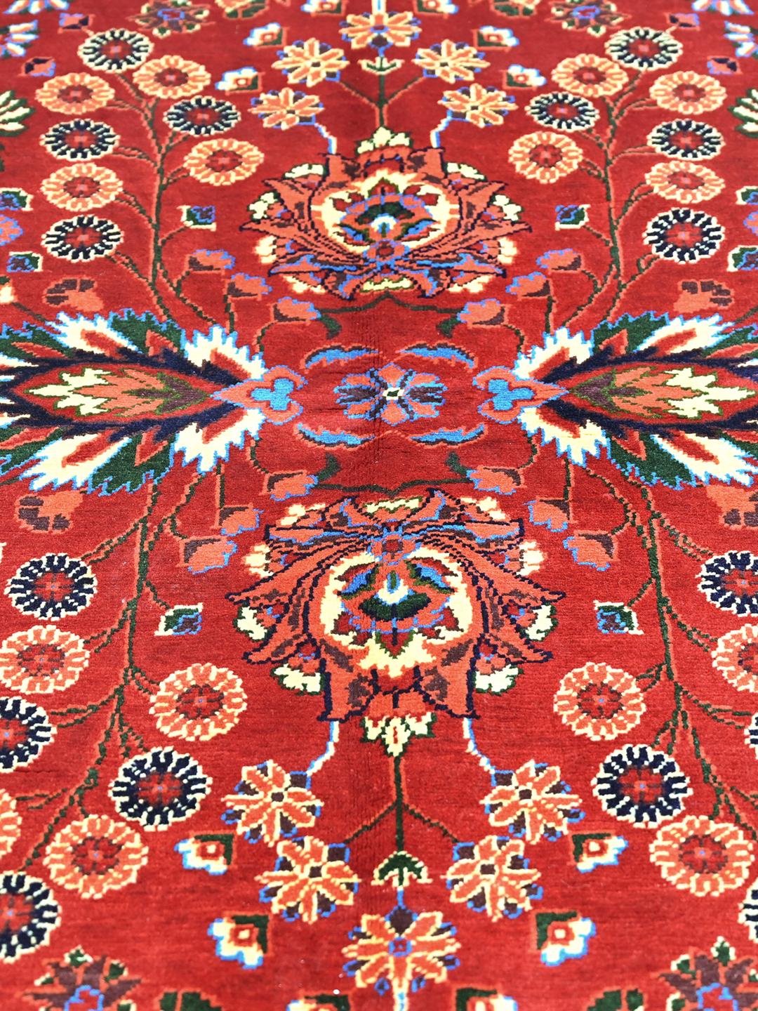 Handgeknoopt Afghaans Kunduz-tapijt met een rood veld van Wool en een blauwe rand