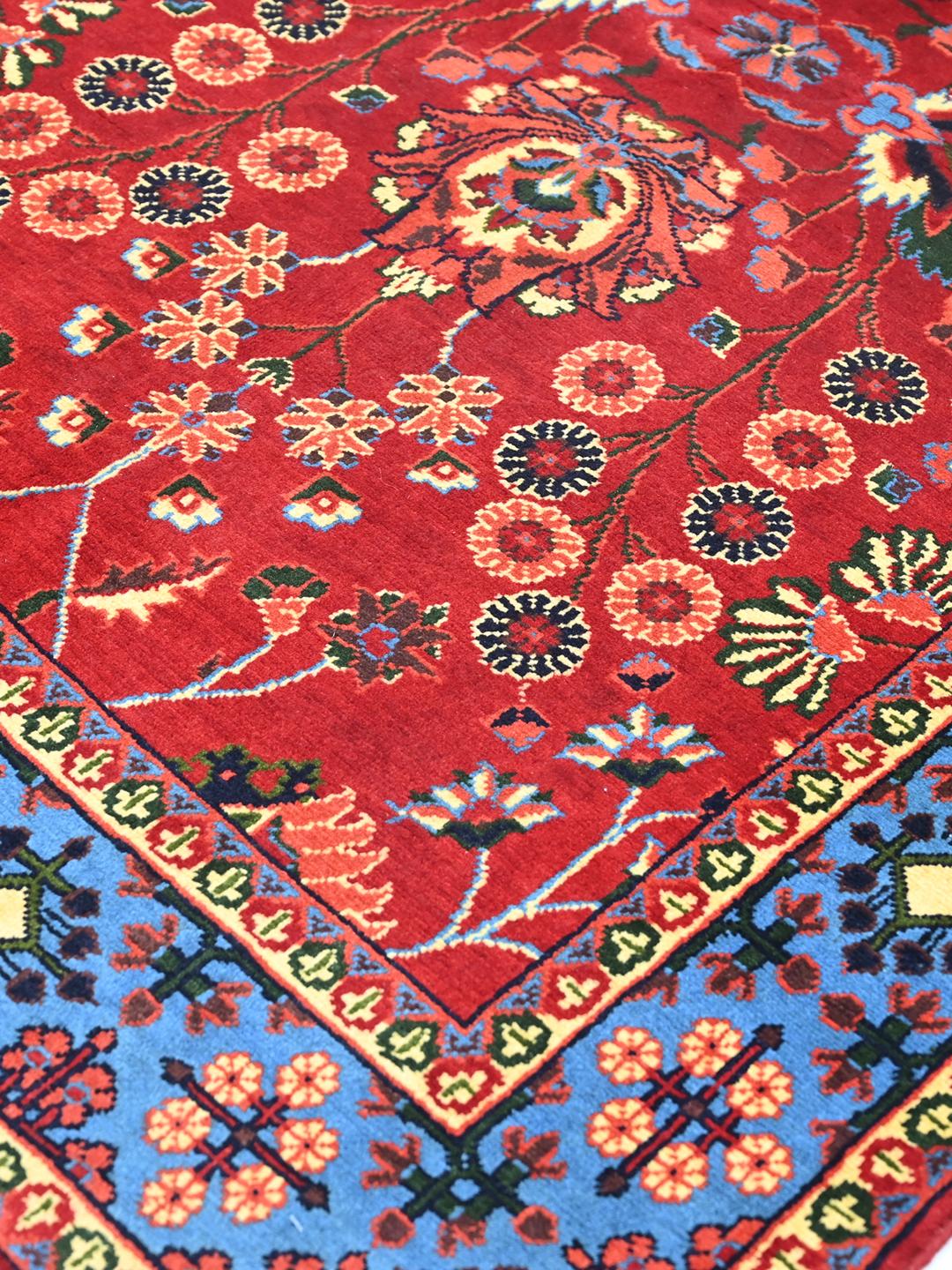 Handgeknoopt Afghaans Kunduz-tapijt met een rood veld van Wool en een blauwe rand
