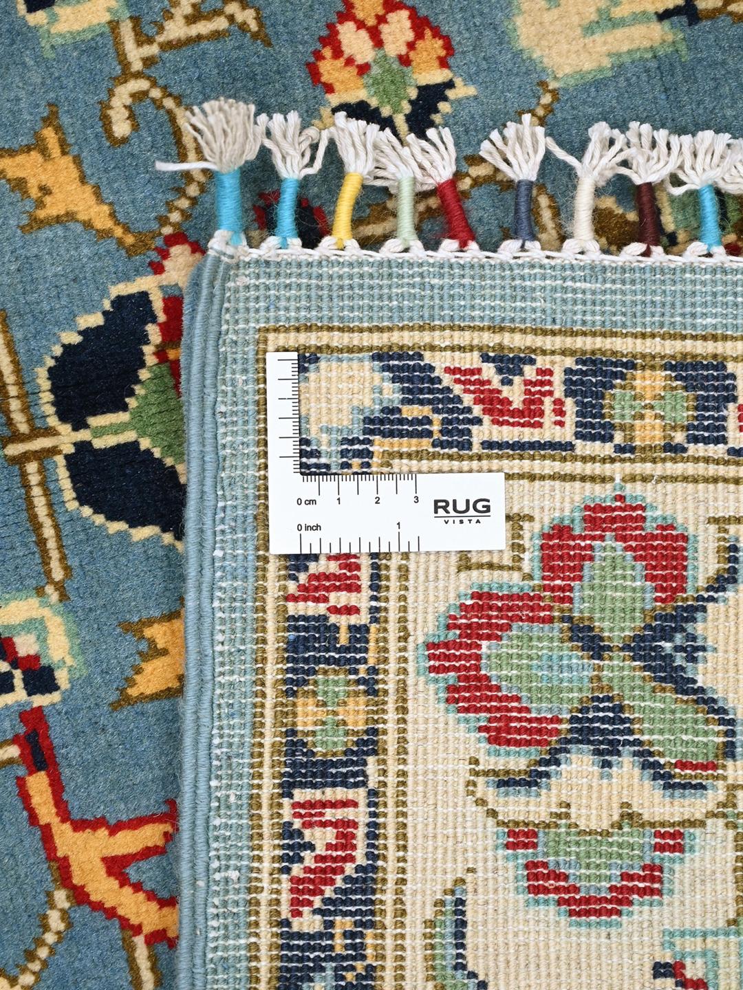 Handgeknoopt Afghaans Kunduz-tapijt in blauw met bloemmotieven